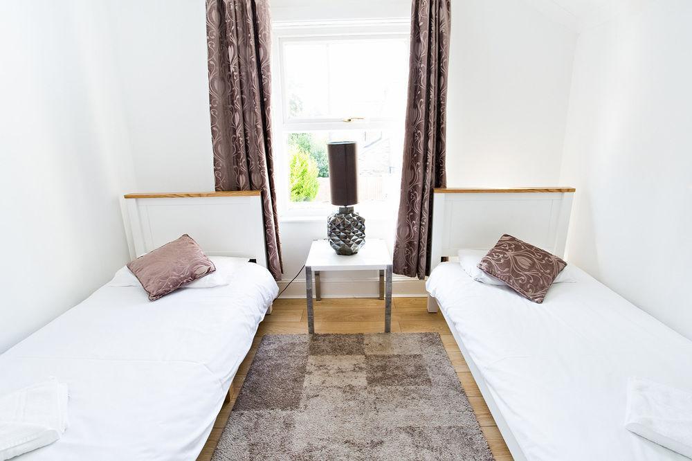 Cambridge House Hotel Bagian luar foto